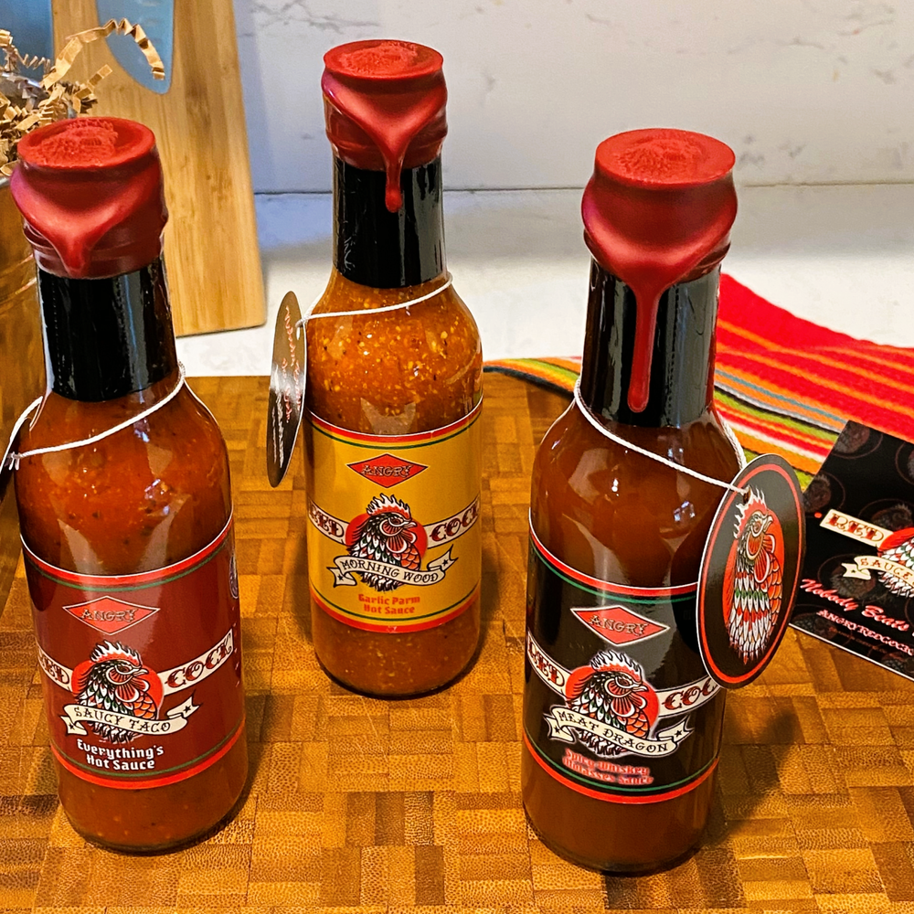 
                  
                    3-Cocks In-A-Box Hot Sauce Combo from Angry Red Cock Sauce & Rub Handcrafted in the U.S.A. Nobody Beats the Cock
                  
                