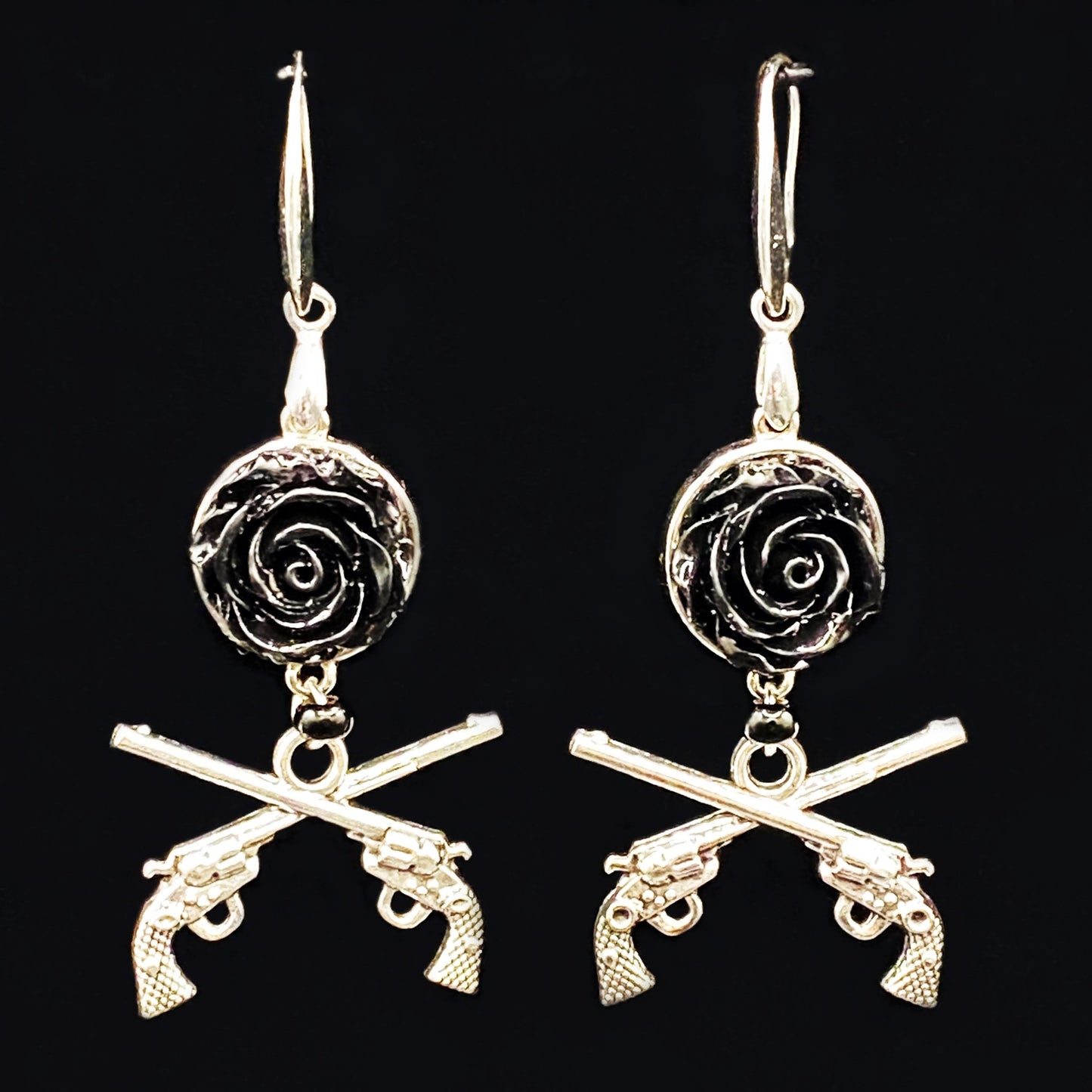 
                  
                    Guns & Roses Pistol & Black Rose Charm Earrings from Neanie-Bot Handmade Jewelry Creations Treasures From a Robot Brain
                  
                