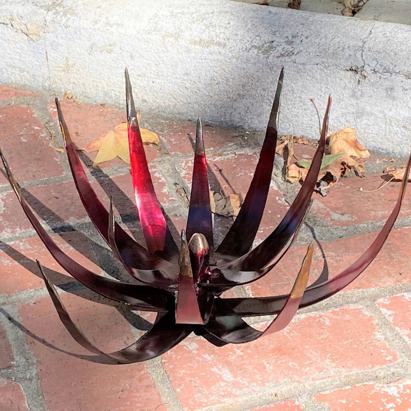 The Red Dwarf Sculpture from Succulent Metals Welded Artistry HANDMADE ARTISAN METALWORK Fusion of Strength & Beauty